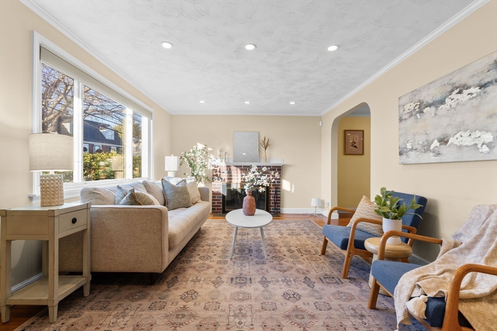 512 Appleton Street Arlington, MA 02476 - Photo 3 of 42 a living room with furniture and a large window