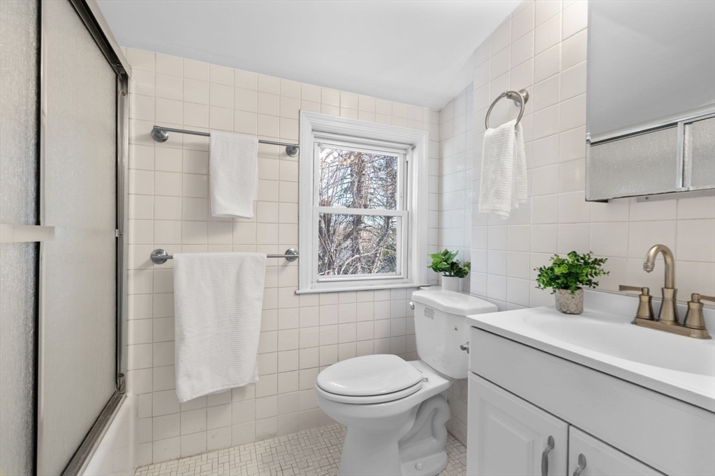 512 Appleton Street Arlington, MA 02476 - Photo 31 of 42 a bathroom with a sink a toilet and shower