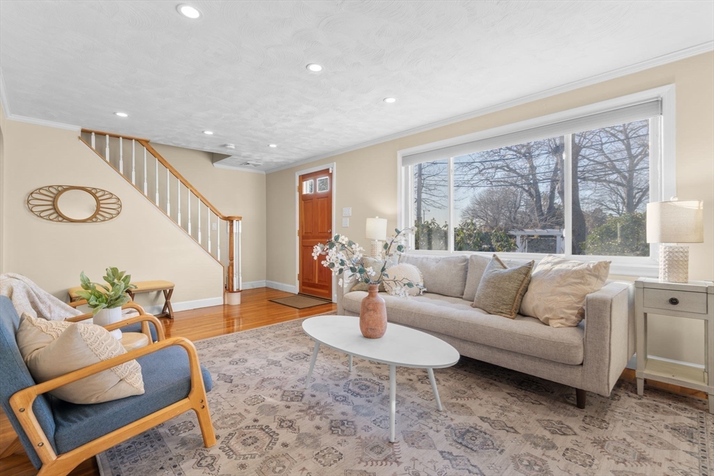 512 Appleton Street Arlington, MA 02476 - Photo 5 of 42 a living room with furniture and a large window