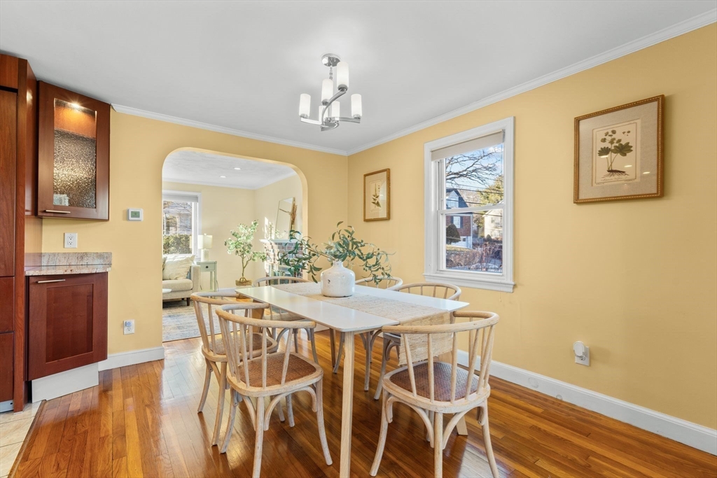 512 Appleton Street Arlington, MA 02476 - Photo 9 of 42 a view of a dining room with furniture and wooden floor