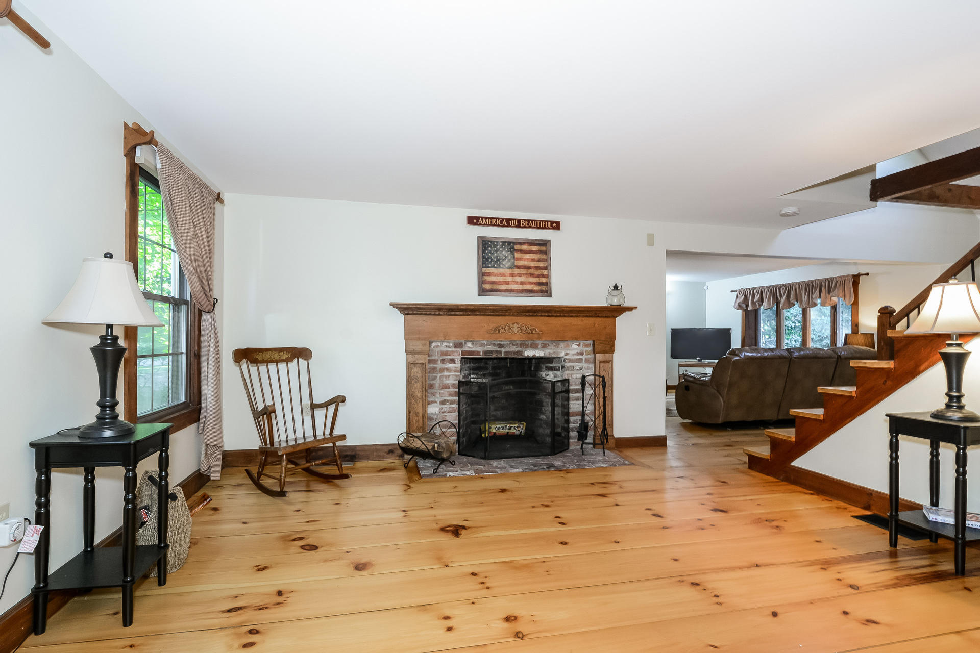 151 Cap'n Lijah's Road Centerville, MA 02632 - Photo 5 of 30 a living room with furniture and a fireplace