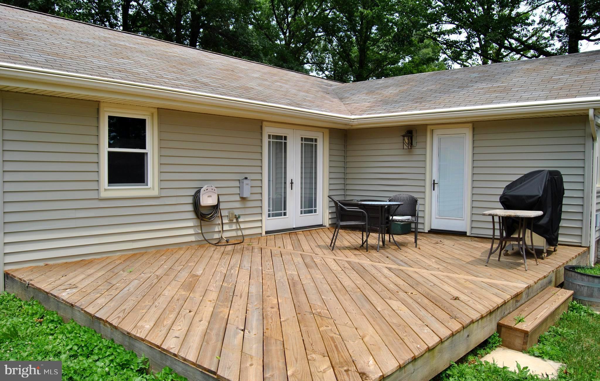 5453 Stone Road Frederick, MD 21703 - Photo 11 of 12 Deck is just part of backyard entertaining space