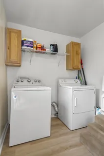 a utility room with washer and dryer