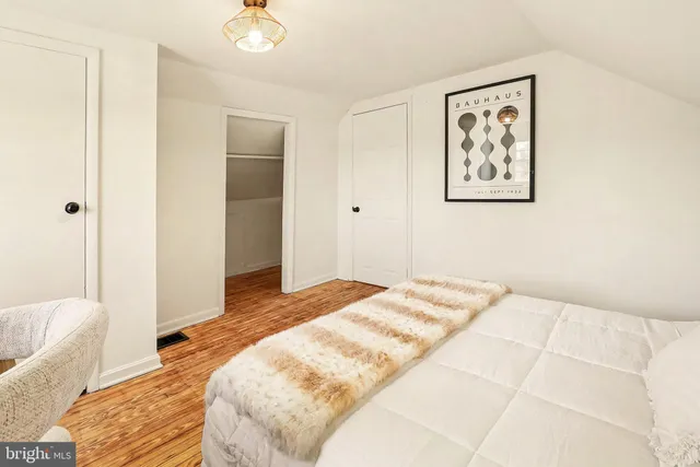 a view of a swimming pool with outdoor seating