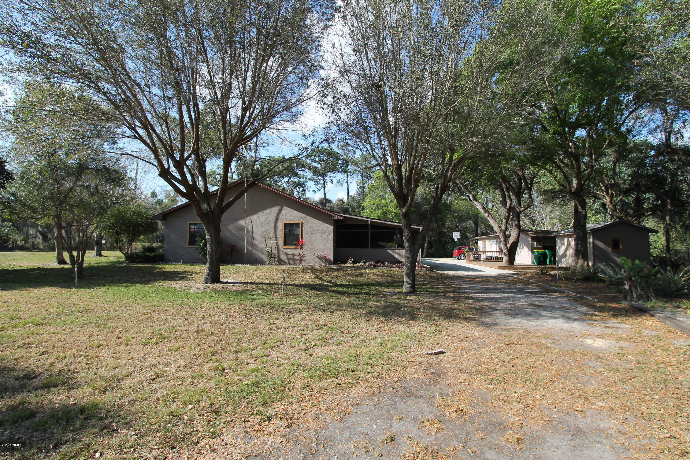 5645 Lord Street Mims, FL 32754 - Photo 3 of 52 right side of home