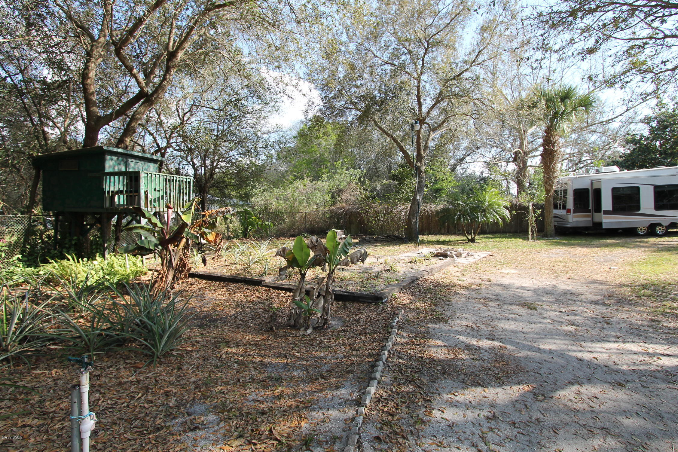5645 Lord Street Mims, FL 32754 - Photo 42 of 52 circle drive to the right side of home