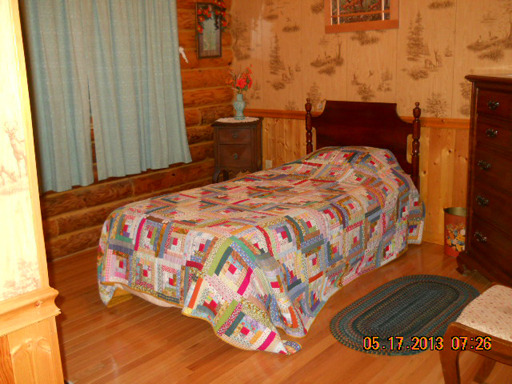 1136 Cumberland Road Magnolia, IL 61336 - Photo 5 of 16 a bedroom with a bed and dresser