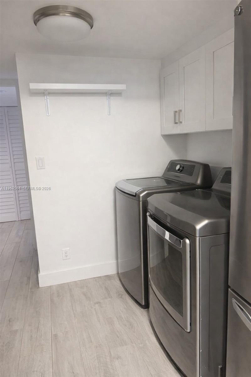 1703 Southwest 131st Pl Circle South Miami, FL 33175 - Photo 13 of 36 a stove top oven sitting inside of a kitchen
