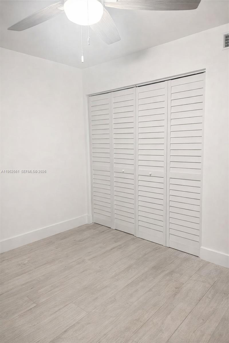 1703 Southwest 131st Pl Circle South Miami, FL 33175 - Photo 29 of 36 an empty room with a empty space