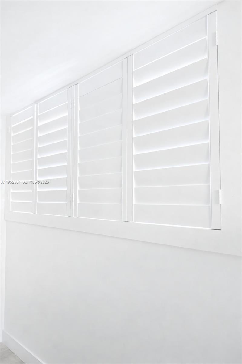 1703 Southwest 131st Pl Circle South Miami, FL 33175 - Photo 30 of 36 a view of a window with wooden floor