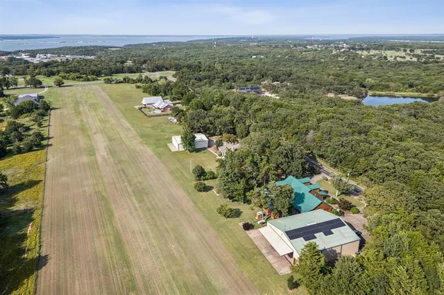 a view of a house with sitting area and a patio