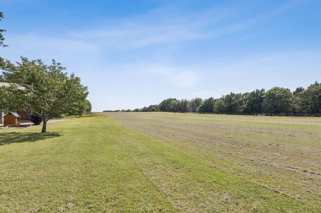 a view of house with outdoor space