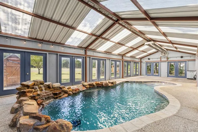 a view of a yard with a large tree