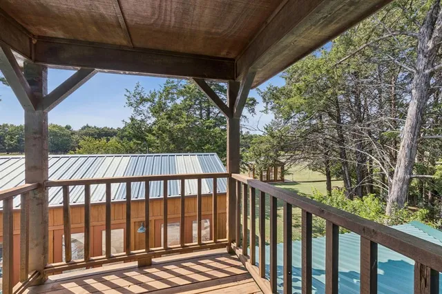 a view of a wooden street from a balcony