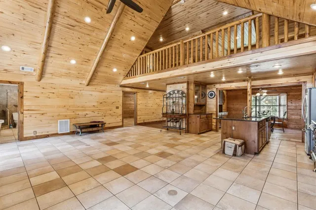 a view of a chairs and tables in patio