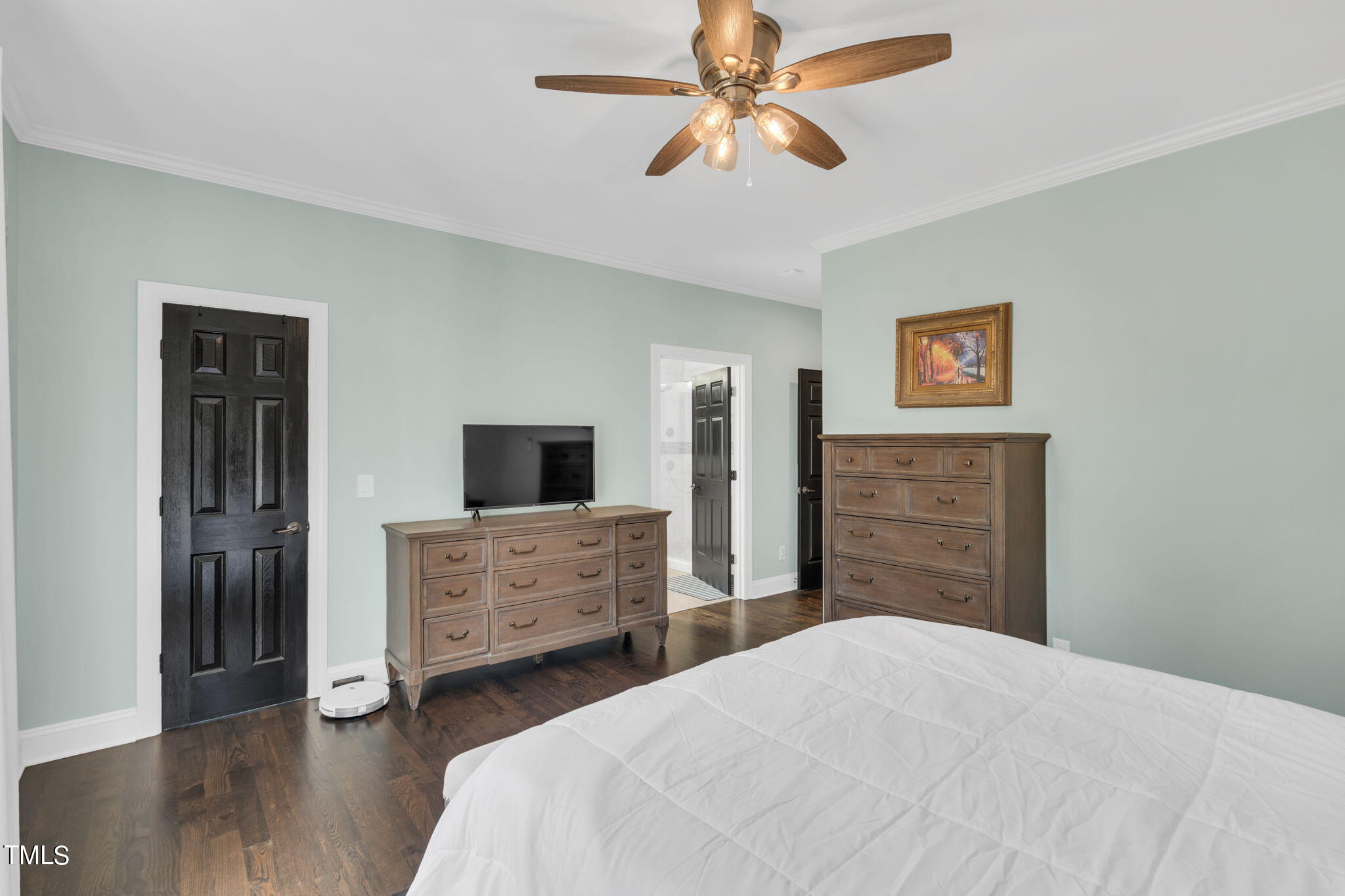 4301 Sprague Road Raleigh, NC 27613 - Photo 22 of 46 a bedroom with a bed and a dresser