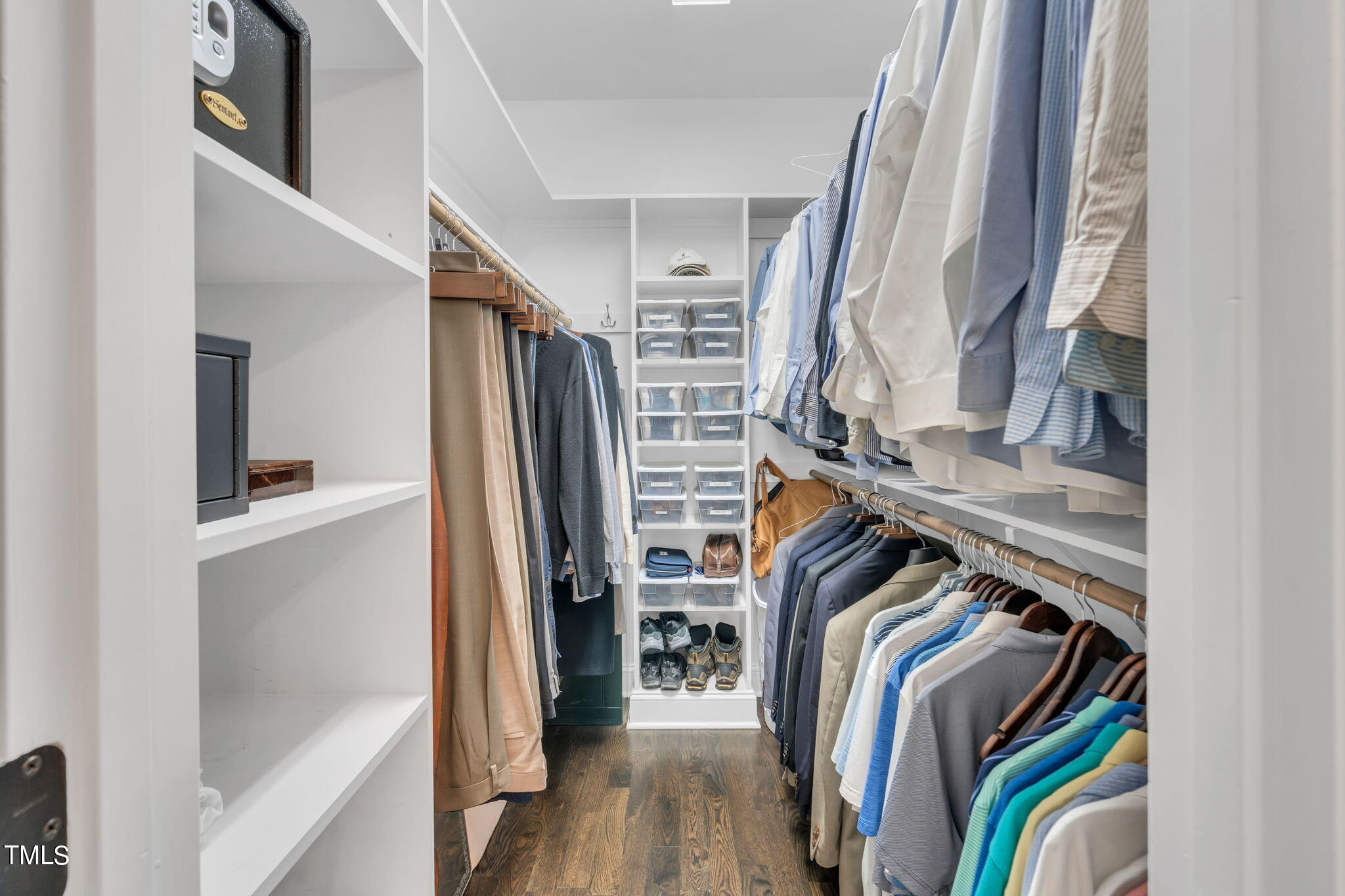 4301 Sprague Road Raleigh, NC 27613 - Photo 23 of 46 a view of walk in closet with clothes and shoes