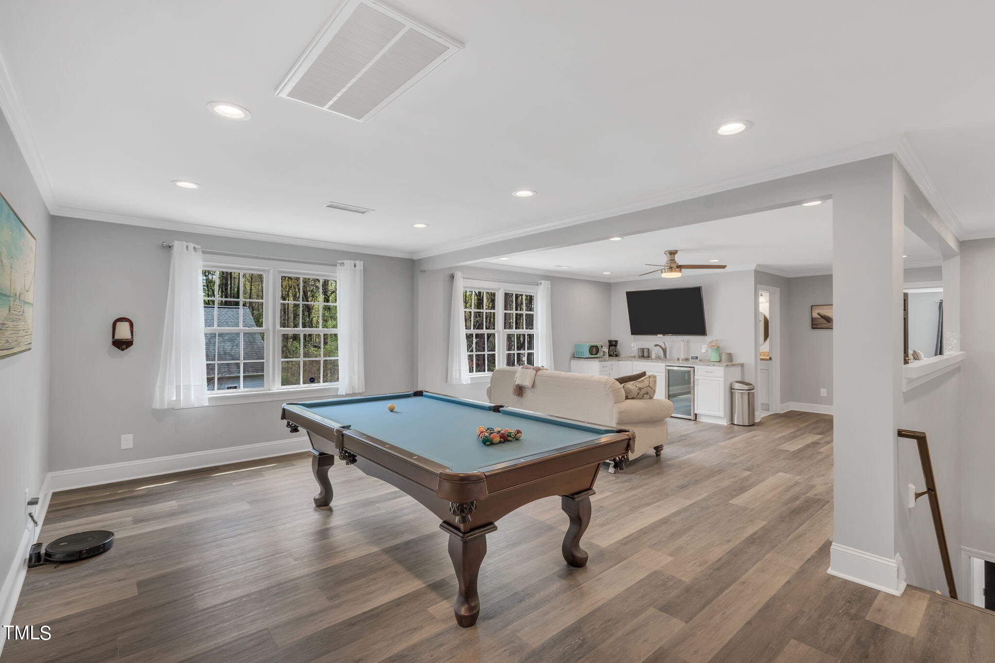 4301 Sprague Road Raleigh, NC 27613 - Photo 26 of 46 a living room with furniture pool table and a large window