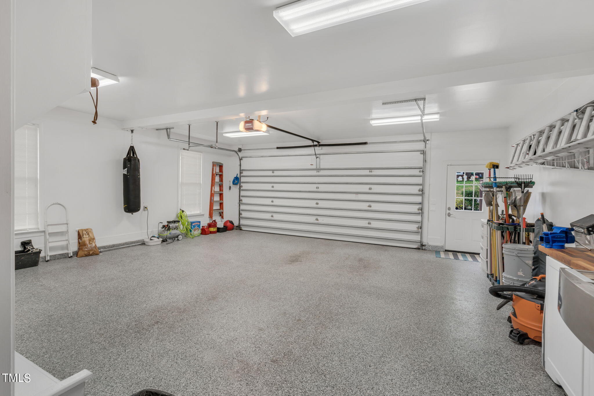 4301 Sprague Road Raleigh, NC 27613 - Photo 39 of 46 a view of a room with gym equipment