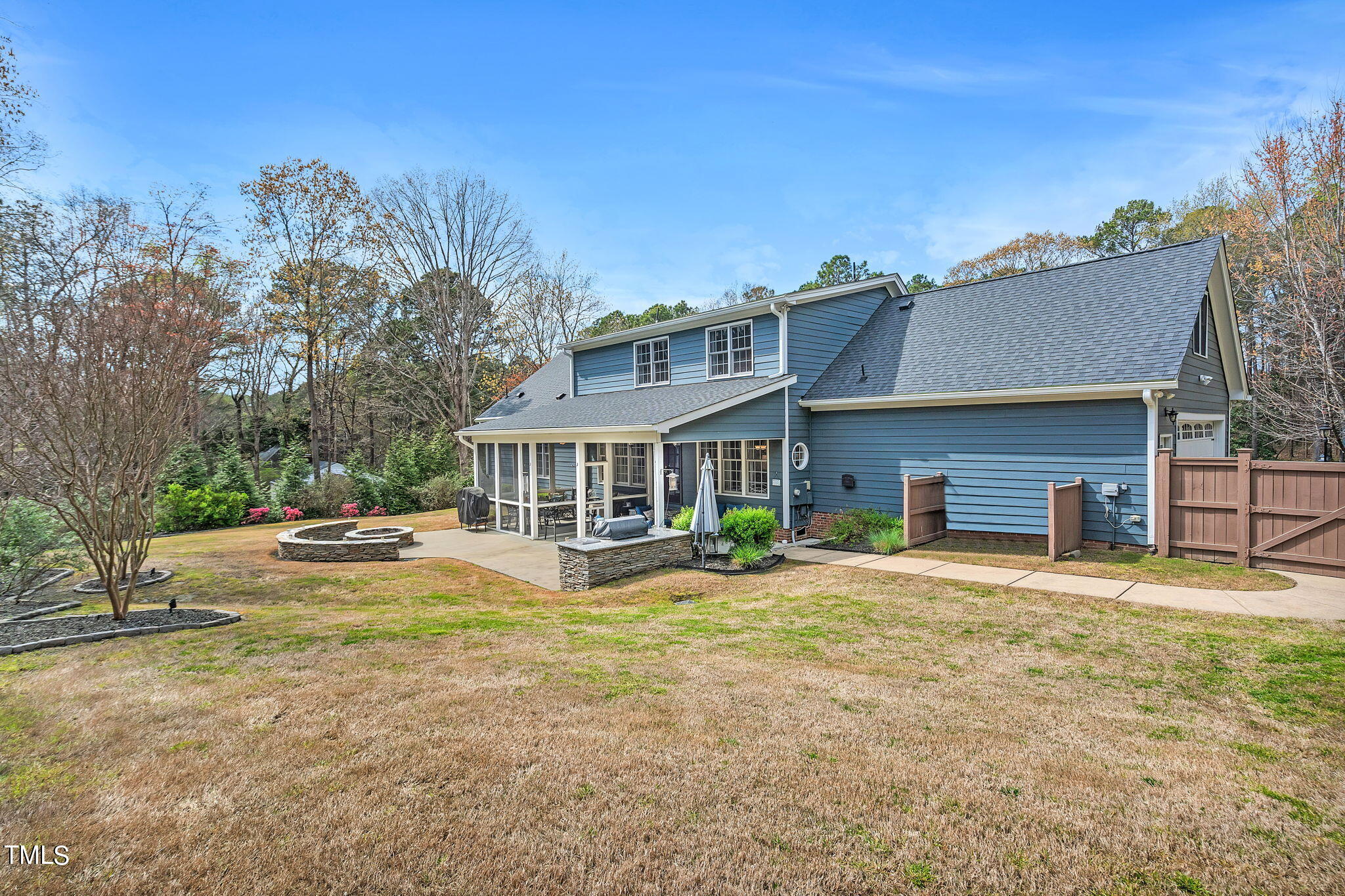 4301 Sprague Road Raleigh, NC 27613 - Photo 42 of 46 a view of a house with a yard and sitting area