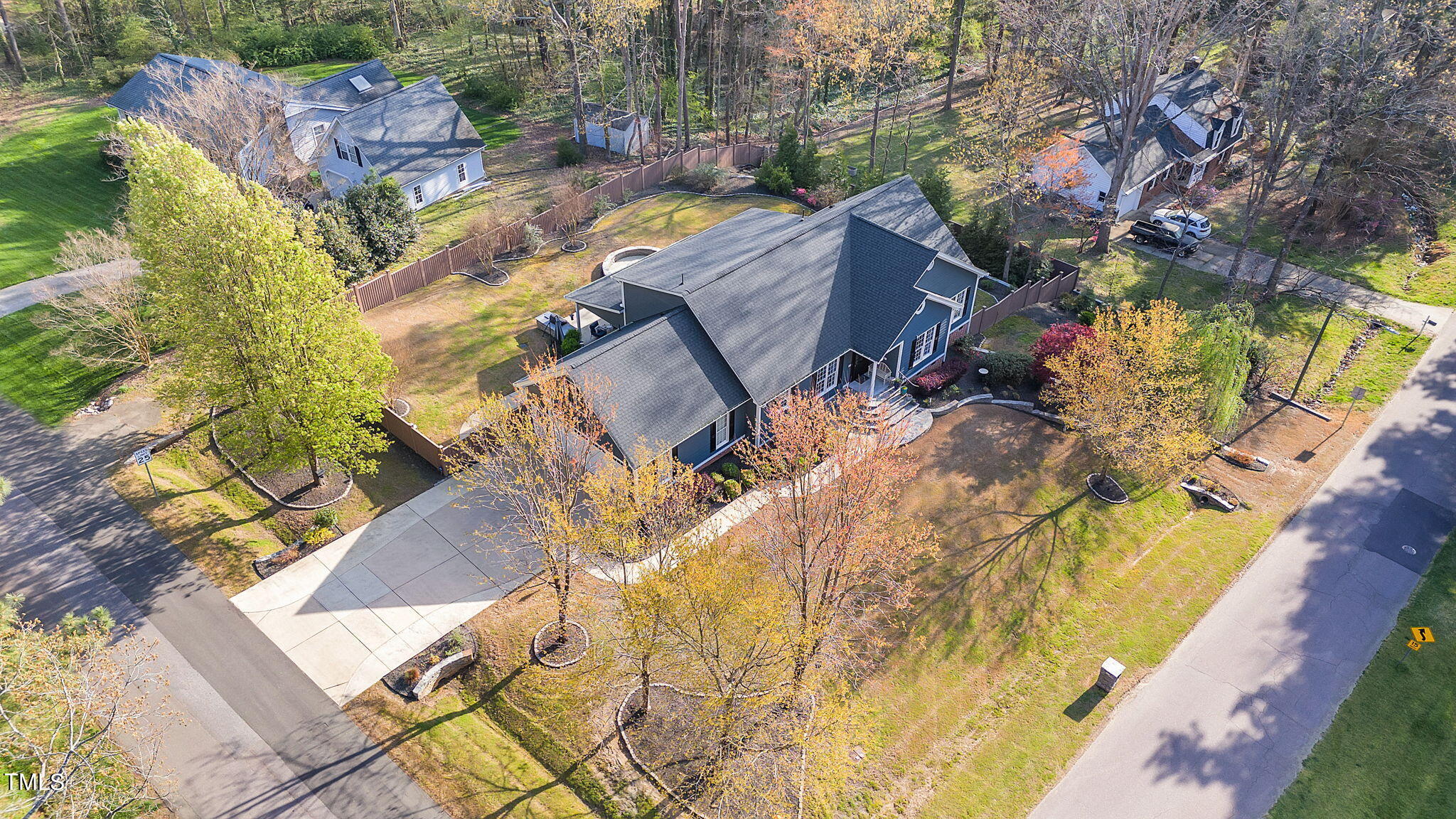 4301 Sprague Road Raleigh, NC 27613 - Photo 46 of 46 an aerial view of a house with a yard swimming pool and outdoor seating