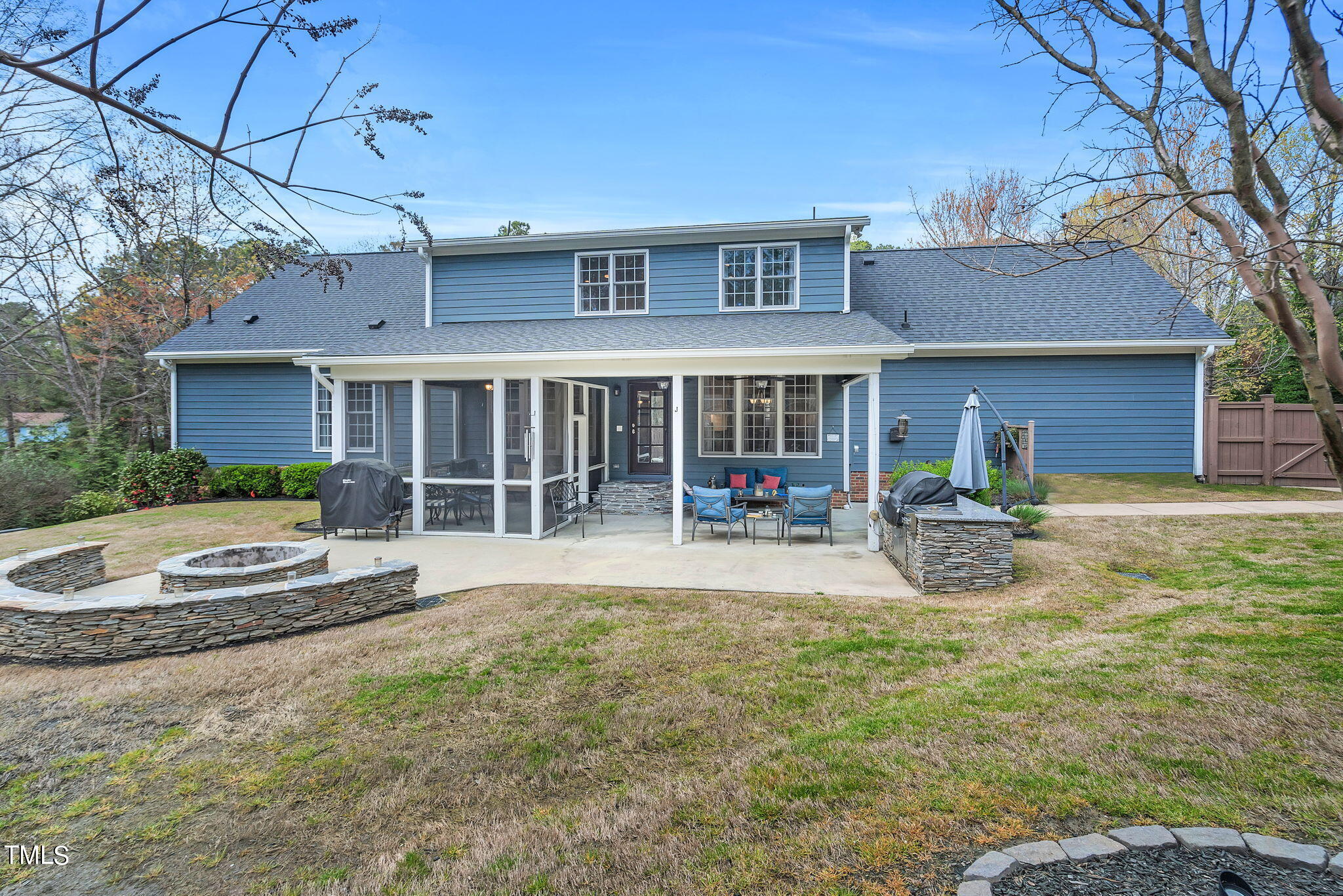 4301 Sprague Road Raleigh, NC 27613 - Photo 7 of 46 a view of a house with a yard and sitting area