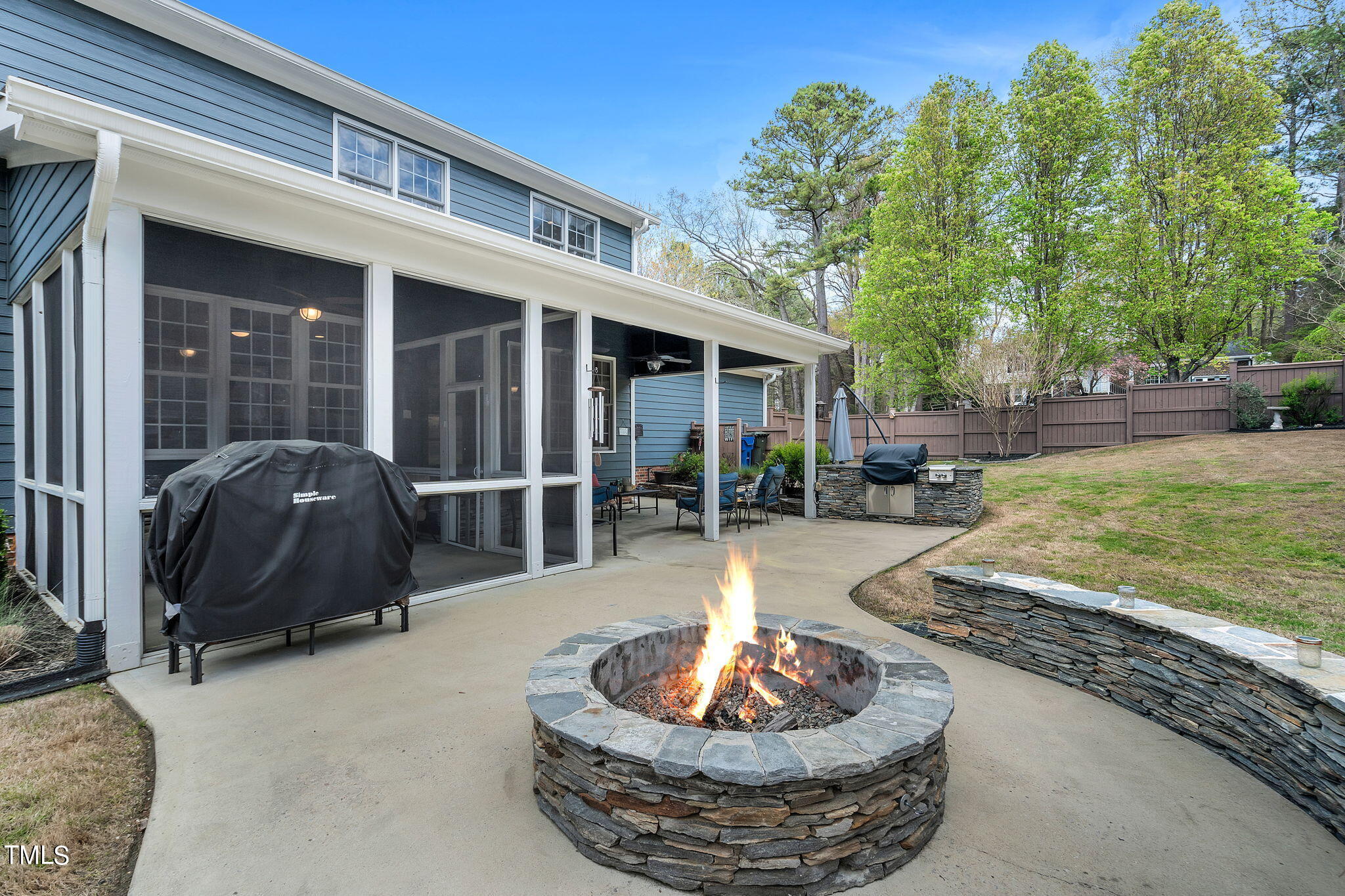 4301 Sprague Road Raleigh, NC 27613 - Photo 8 of 46 a view of a house with backyard and sitting area