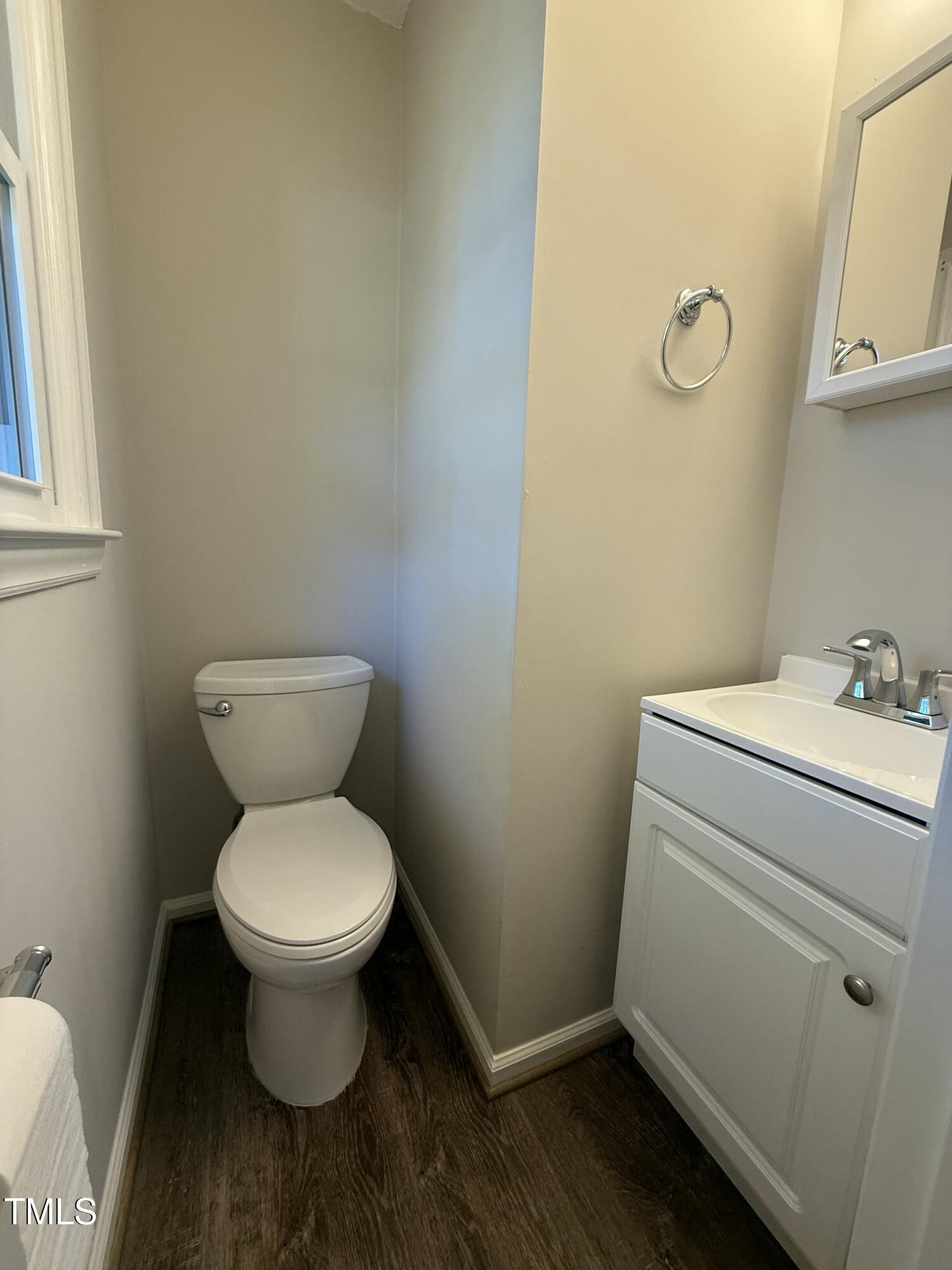 640 Crocker Road Smithfield, NC 27577 - Photo 13 of 28 a bathroom with a toilet and a sink