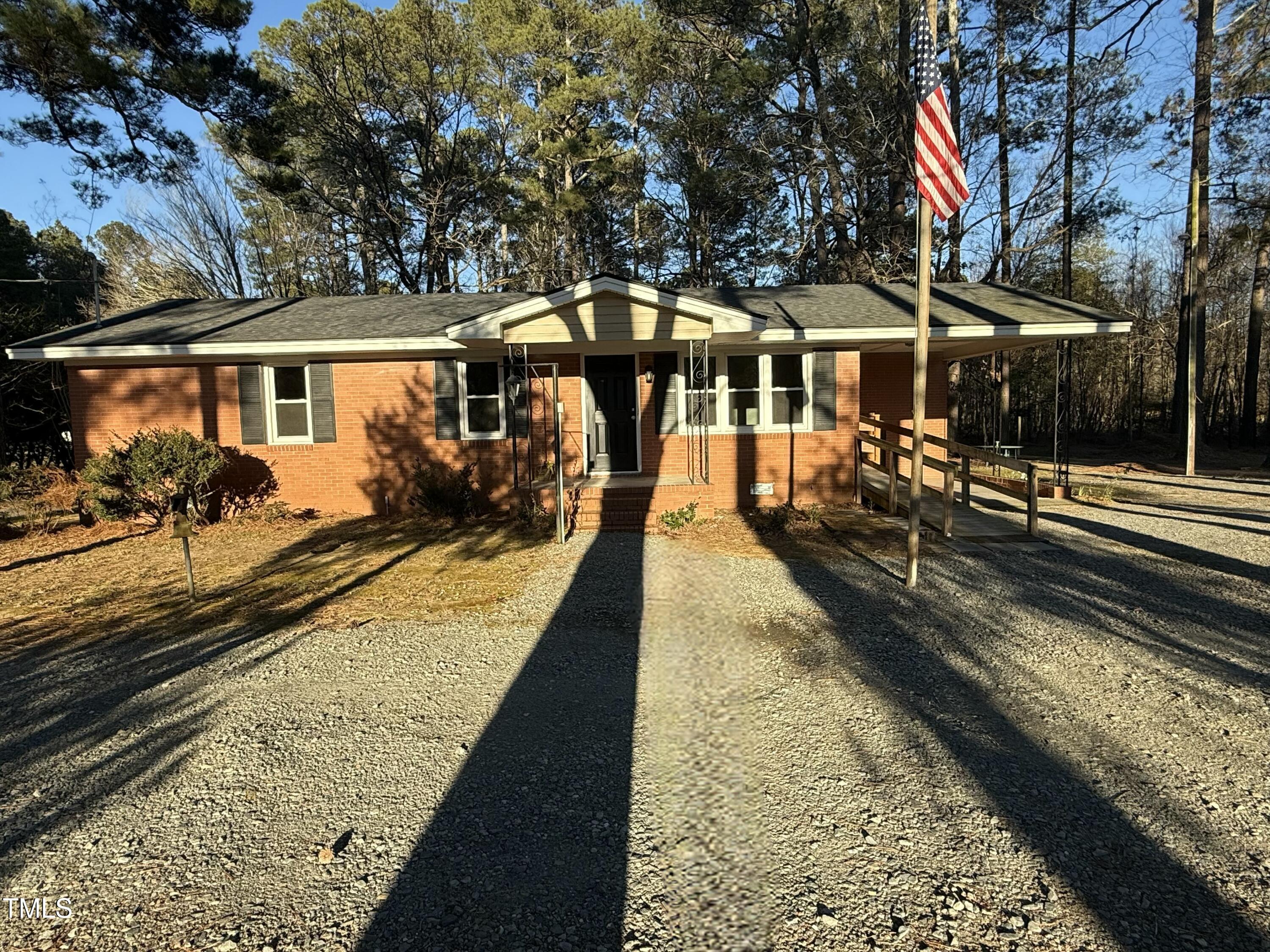 640 Crocker Road Smithfield, NC 27577 - Photo 2 of 28 a view of a house with backyard