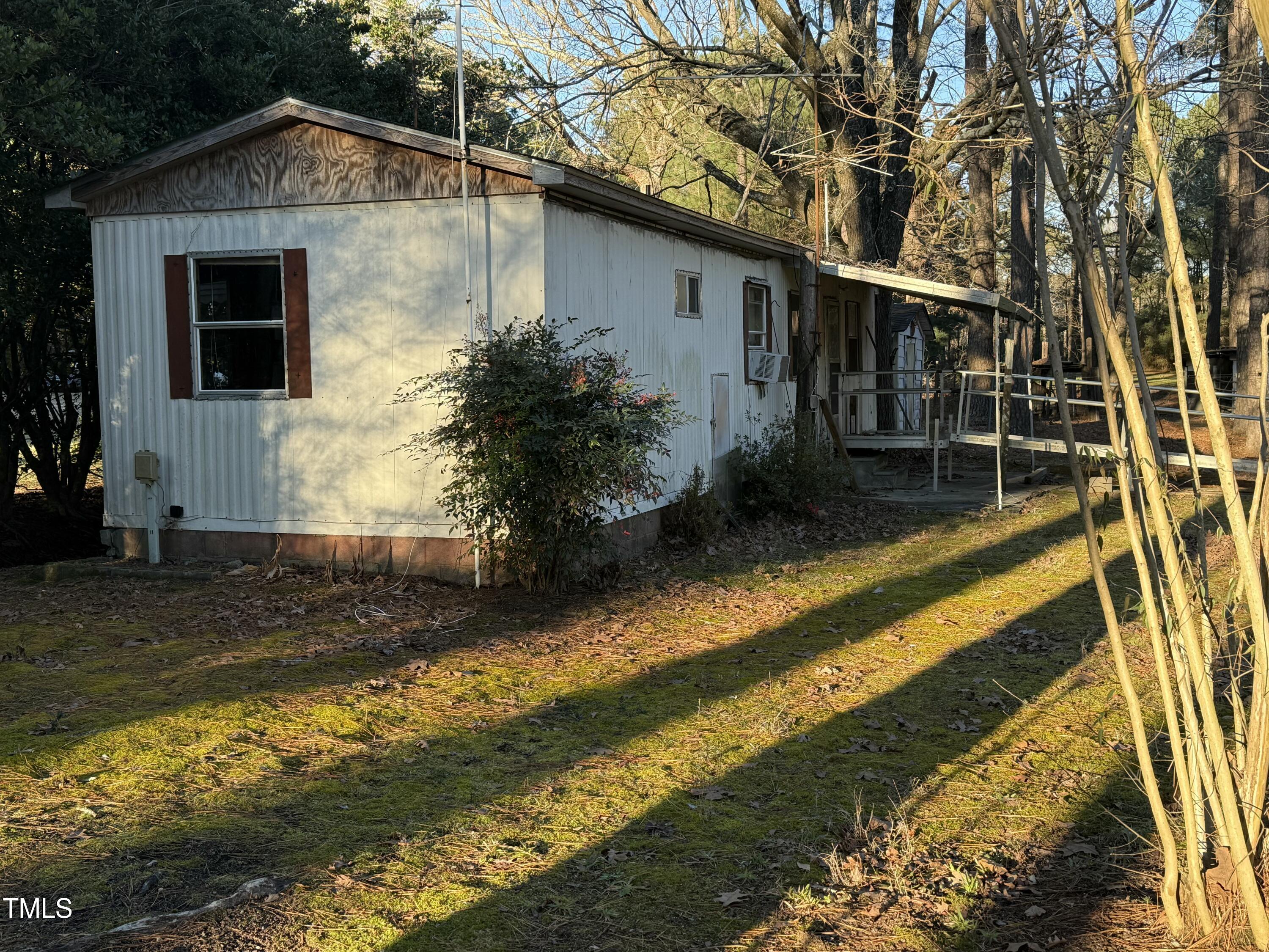 640 Crocker Road Smithfield, NC 27577 - Photo 24 of 28 a front view of a house with a yard