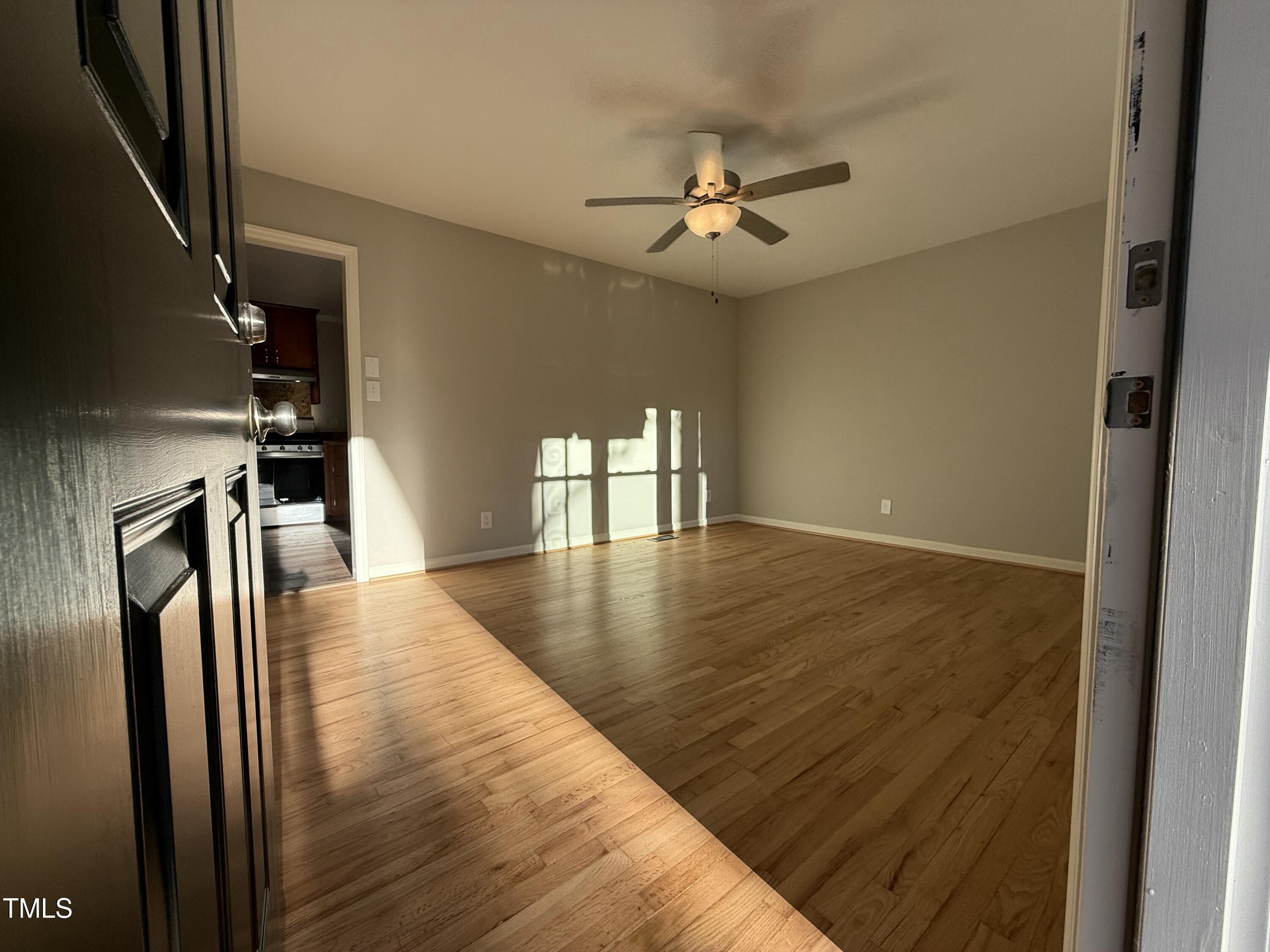 640 Crocker Road Smithfield, NC 27577 - Photo 4 of 28 a view of a livingroom with a staircase