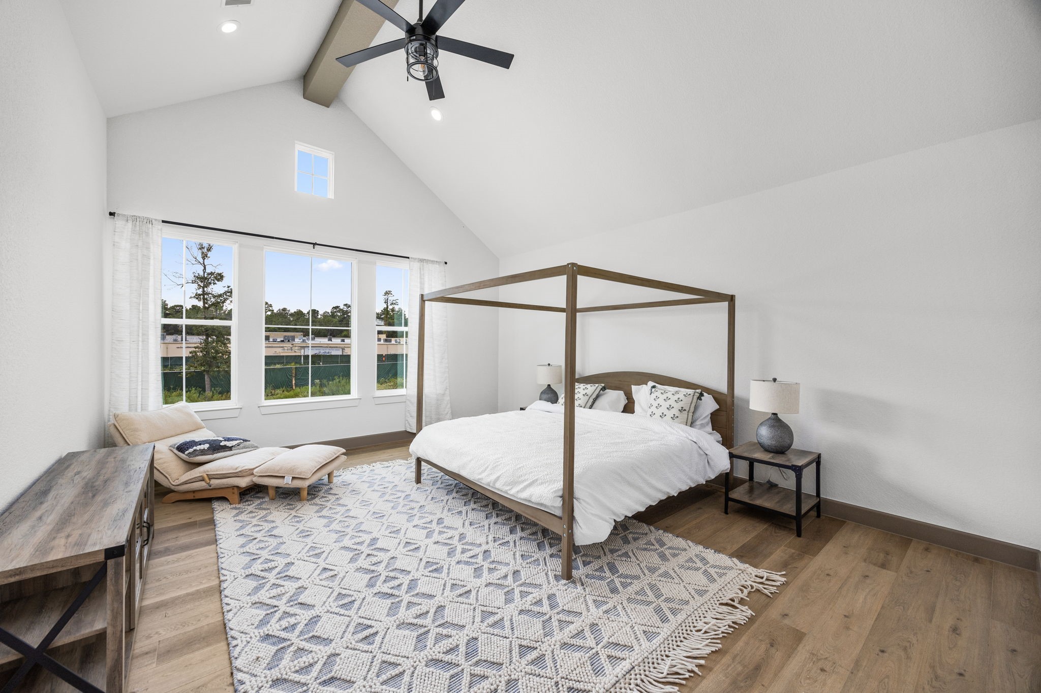 7934 Hennessy Lane, Unit 4 Spring, TX 77389 - Photo 24 of 36 a living room with furniture and wooden floor