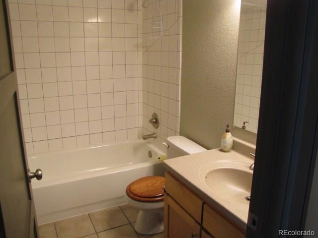 232 Broadway, Unit 2 Denver, CO 80203 - Photo 11 of 12 a bathroom with a sink a toilet and bathtub