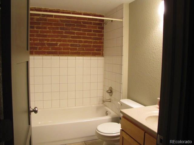 232 Broadway, Unit 2 Denver, CO 80203 - Photo 6 of 12 a bathroom with a bathtub and shower