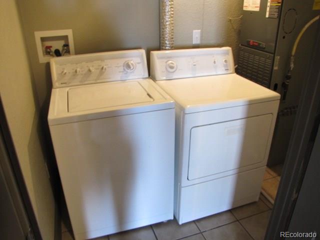 232 Broadway, Unit 2 Denver, CO 80203 - Photo 8 of 12 a utility room with dryer and washer