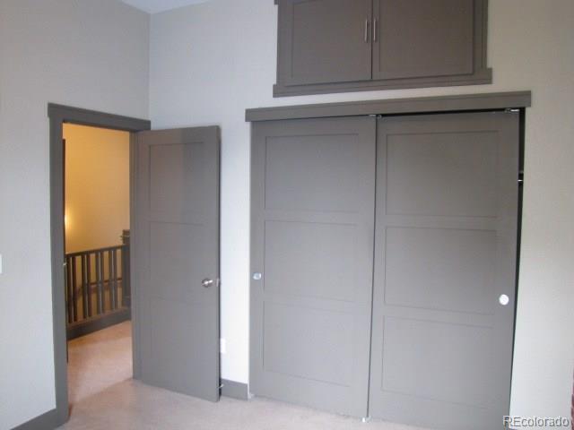 232 Broadway, Unit 2 Denver, CO 80203 - Photo 10 of 12 a view of a hallway with entryway