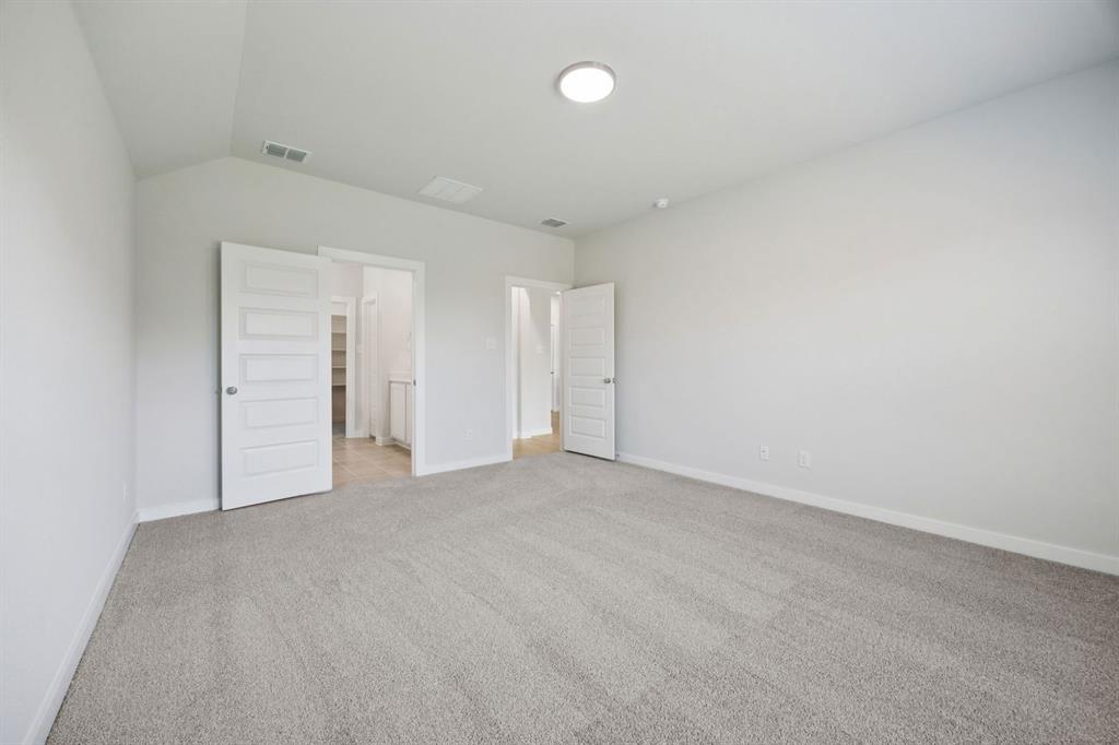 5721 Rushing River Way McKinney, TX 75071 - Photo 16 of 29 Primary Suite in the Heisman home plan by Trophy Signature Homes – REPRESENTATIVE PHOTO