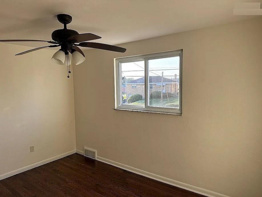 115 Starling Drive McKees Rocks, PA 15136 - Photo 11 of 12 a view of a small space with wooden floor and windows