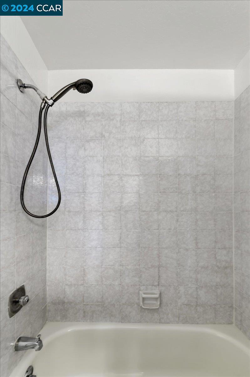 1050 Wesley Court Walnut Creek, CA 94597 - Photo 25 of 32 a bathroom with a shower