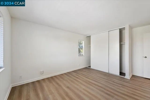 a view of a pathway besides a building