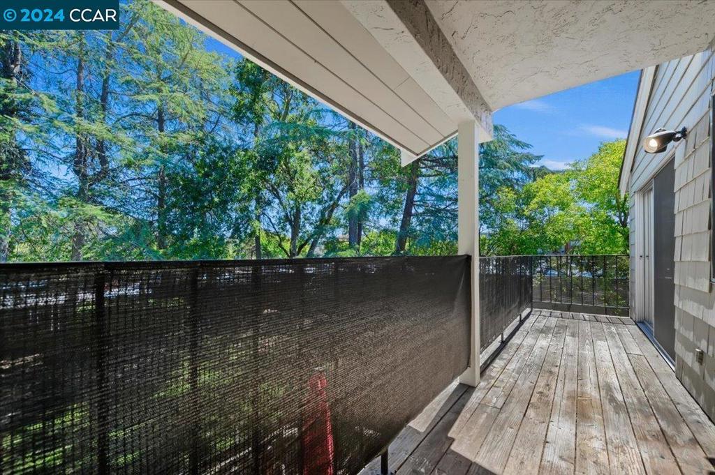 1050 Wesley Court Walnut Creek, CA 94597 - Photo 3 of 32 a view of a lake from a balcony