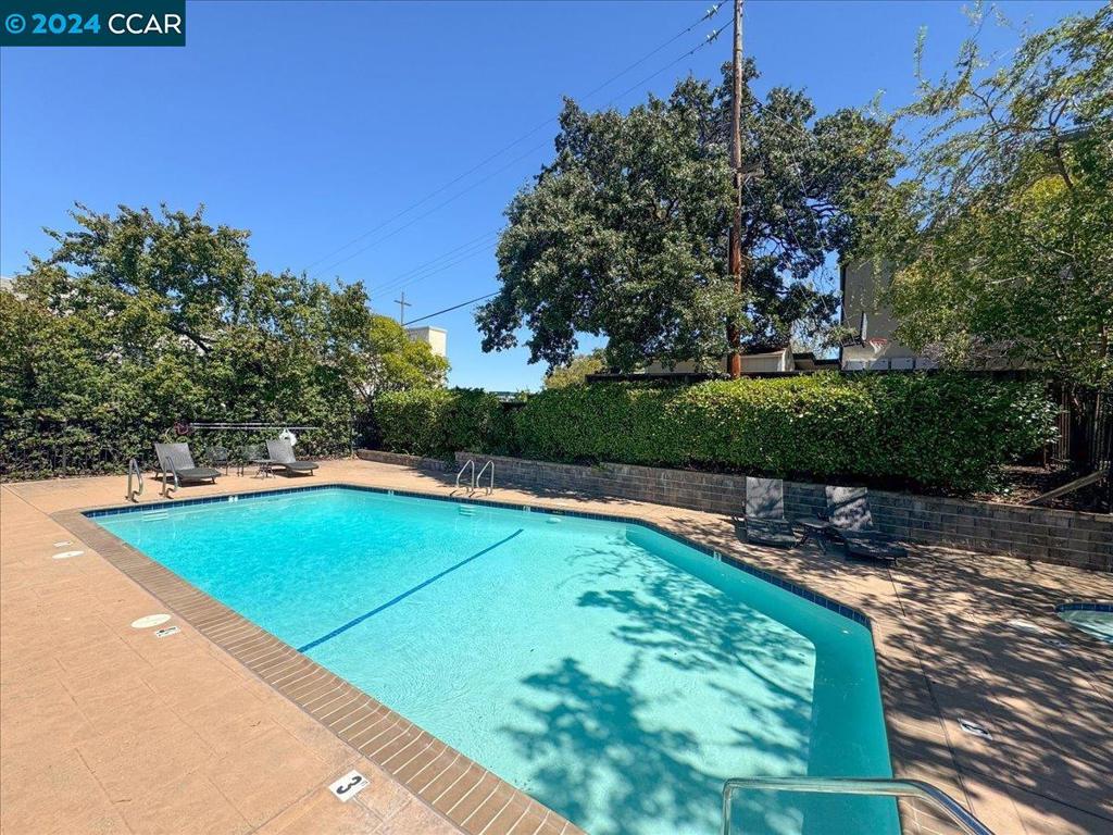 1050 Wesley Court Walnut Creek, CA 94597 - Photo 32 of 32 a view of a tennis ground with large trees