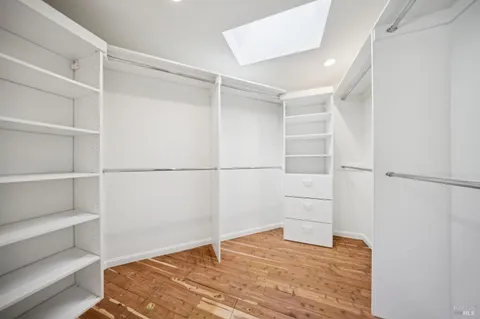 a bathroom with a shower and a bath tub