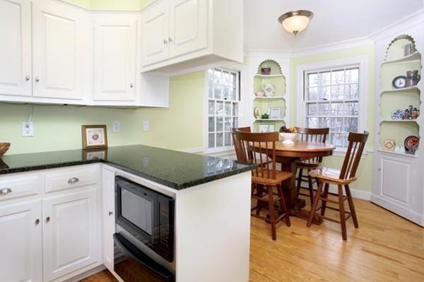 110 Arlington Road Brookline, MA 02467 - Photo 8 of 12 a view of a kitchen counter space and breakfast area