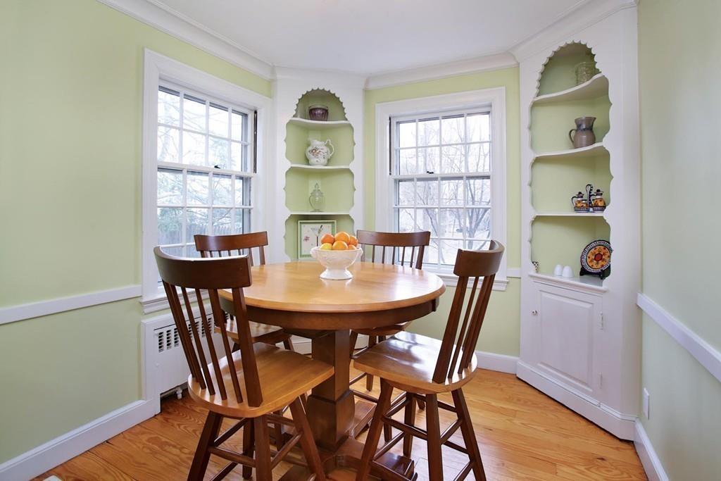110 Arlington Road Brookline, MA 02467 - Photo 9 of 12 a view of a dining room with furniture and window