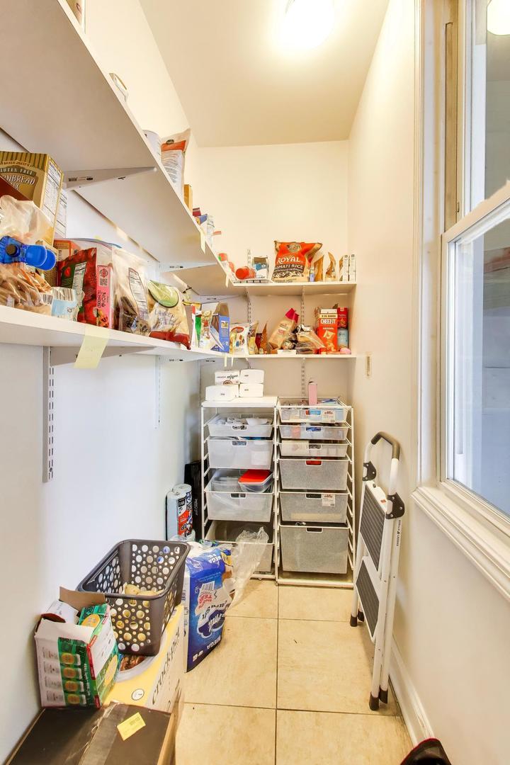 3519 North Seminary Avenue Chicago, IL 60657 - Photo 18 of 43 a storage room with washer and dryer