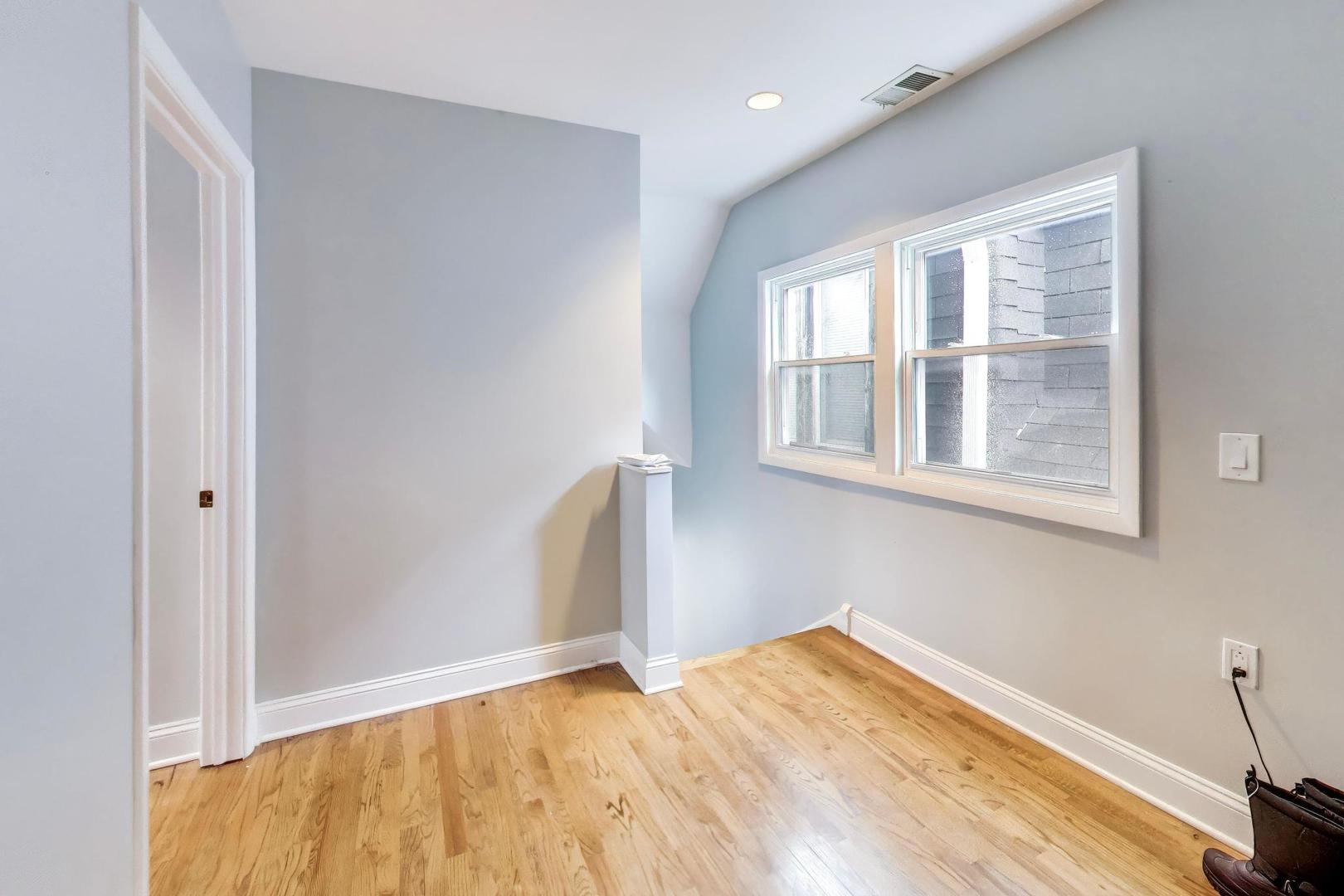 3519 North Seminary Avenue Chicago, IL 60657 - Photo 26 of 43 a view of empty room with wooden floor