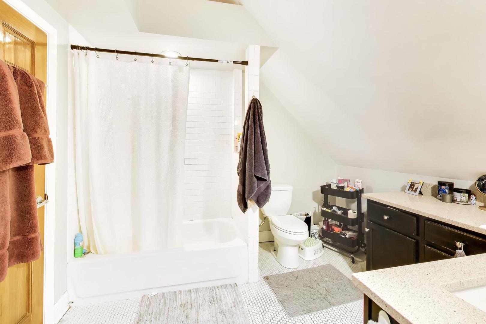3519 North Seminary Avenue Chicago, IL 60657 - Photo 28 of 43 a room with a cabinet and a window