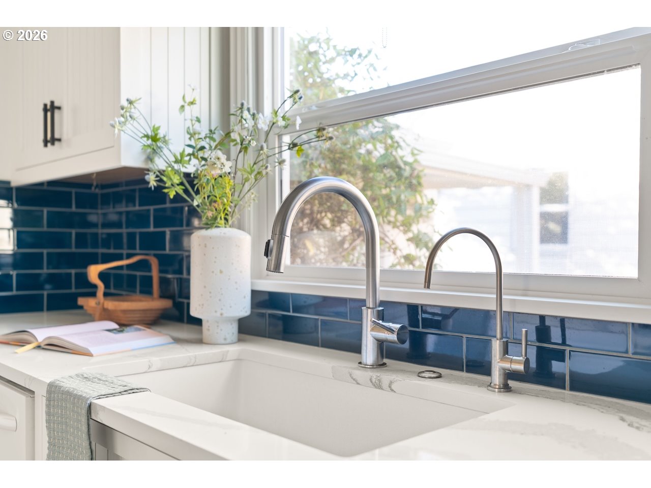 1606 North Alberta Street Portland, OR 97217 - Photo 11 of 46 a view of a sink and a microwave