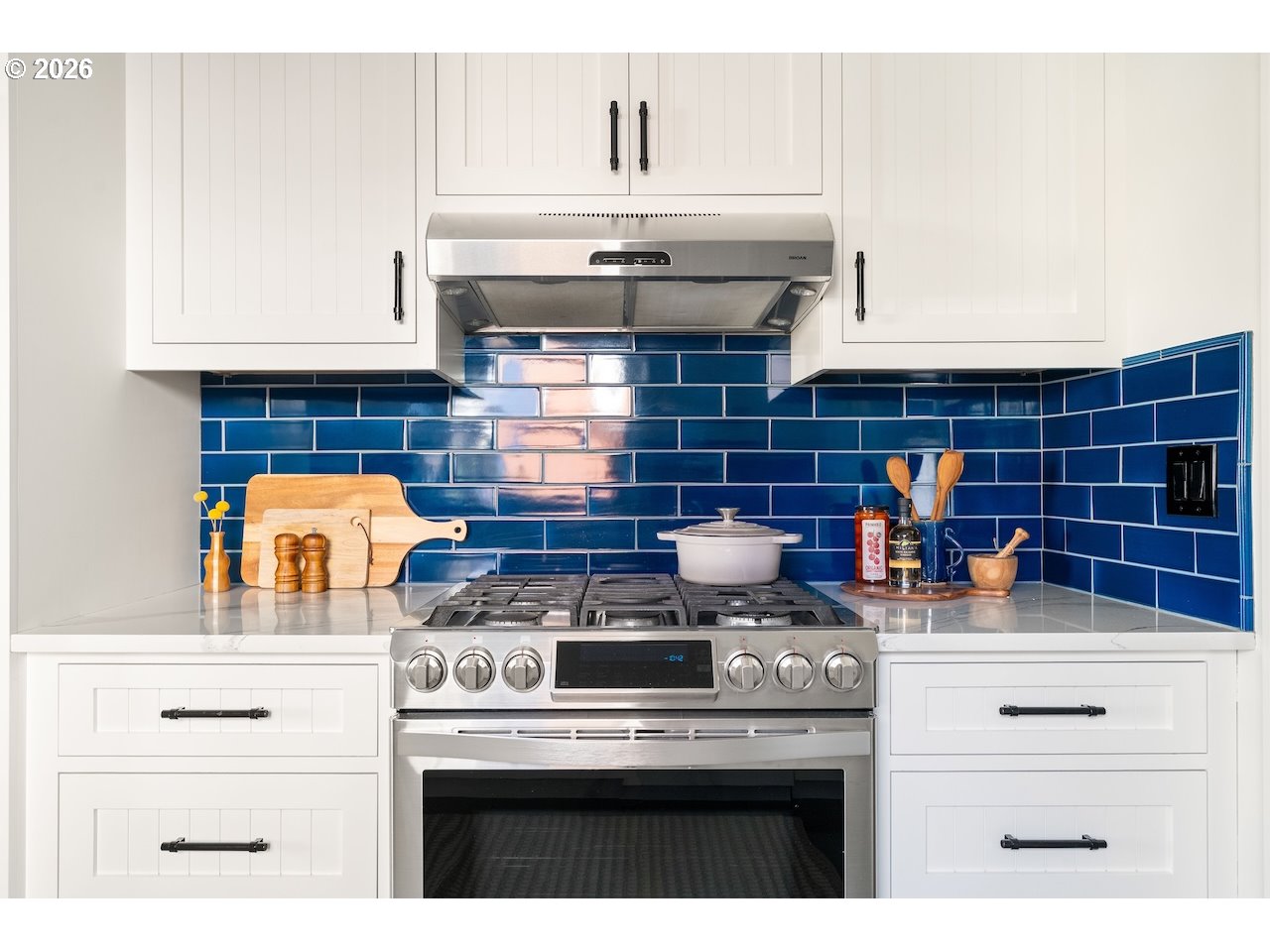 1606 North Alberta Street Portland, OR 97217 - Photo 12 of 46 a kitchen with a stove and cabinets